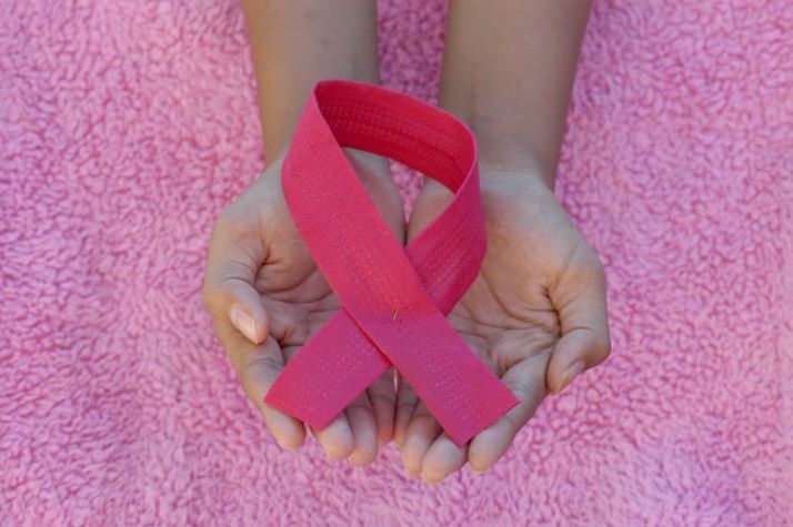 Pink ribbon for awareness of Breast Cancer Day, 10/01/20. Photo by Angiola Harry on Unsplash