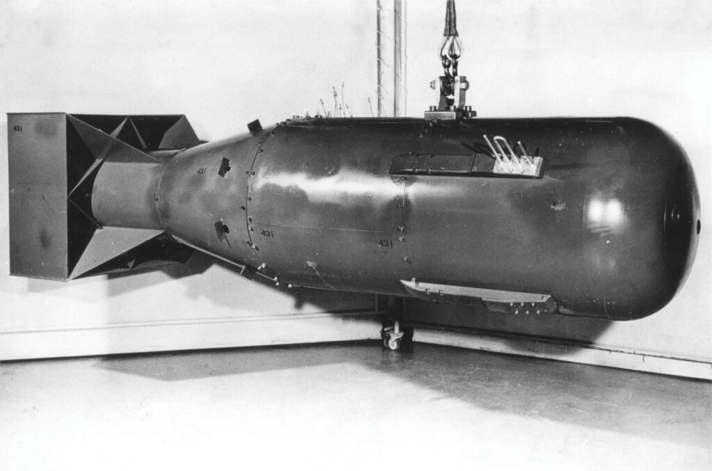 How to Plan for Nuclear Fallout: Your Armor Against the Glow.Photograph of the Little Boy atomic bomb, the same type of weapon dropped on Hiroshima, Japan, in August 1945. This was the first photograph of a Little Boy bomb casing to ever be released by the U.S. government (it was declassified in 1960). This photograph is of a postwar Little Boy unit, and is not the exact bomb dropped over Japan.By US Atomic Energy Commission (now US Department of Energy) - Scanned by Alex Wellerstein at the National Archives and Records Administration Archives II (College Park, Maryland) from the original on August 15, 2008. The original can be found in the Still Pictures branch as 77-AEC-6281. This version has been retouched from the original to remove a line of yellowed tape that had been applied to the photograph, three punched holes in the photograph, a few tears on the original, and some dust incurred by the scanning process., Public Domain, https://commons.wikimedia.org/w/index.php?curid=91886