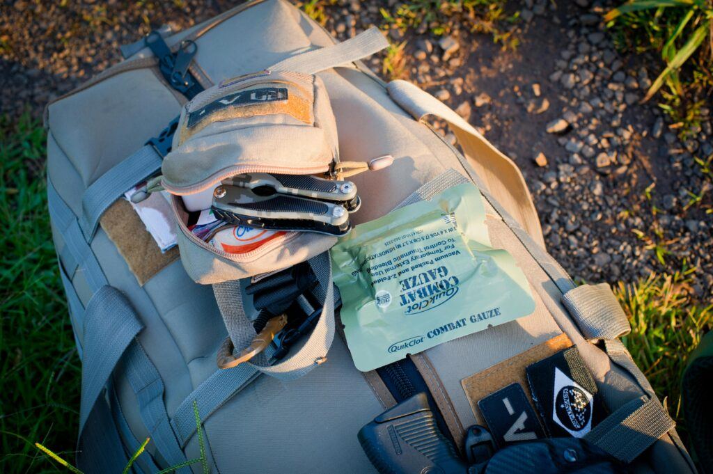 A Guide to Using AI for Survival PreparationsPhoto by Dan Galvani Sommavilla: https://www.pexels.com/photo/khaki-backpack-with-survival-kit-on-the-ground-6694800/